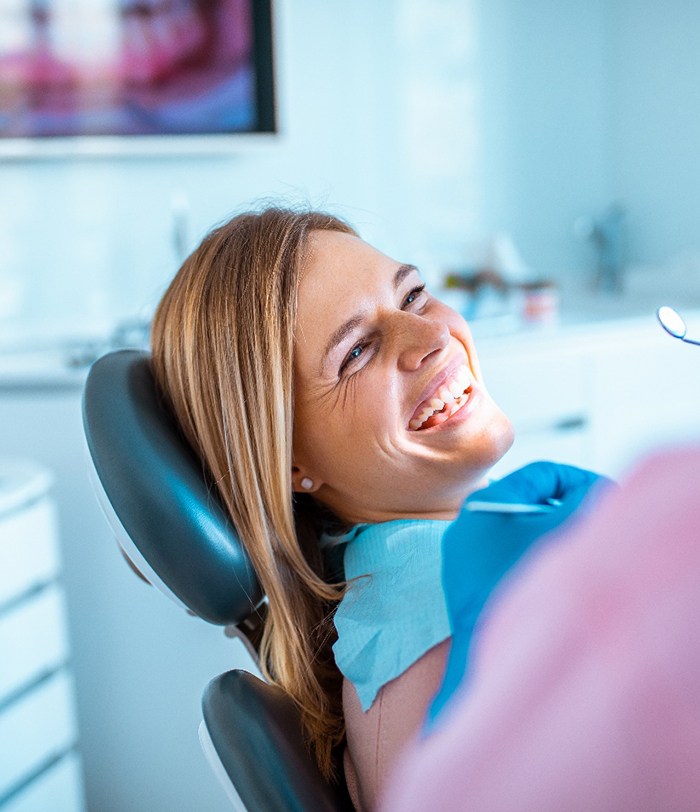 Patient smiling during dental checkup