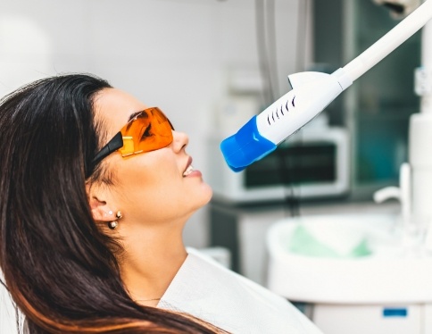 Patient receiving teeth whitening