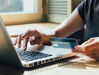 Woman using a credit card