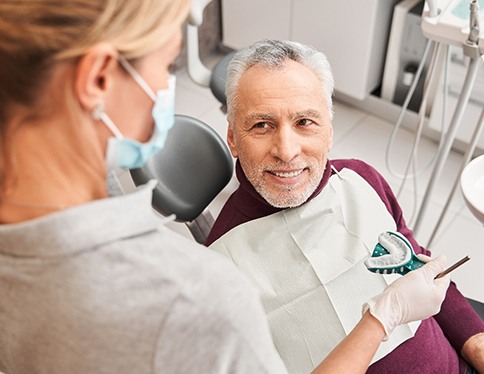 a patient receiving dentures in San Juan Capistrano