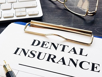 Paperwork for dental insurance coverage for dental implants in San Juan Capistrano