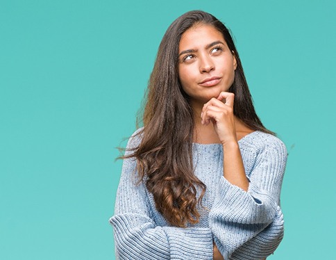 young woman with thinking face