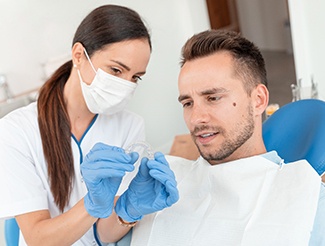 Man at dentist getting Invisalign in San Juan Capistrano