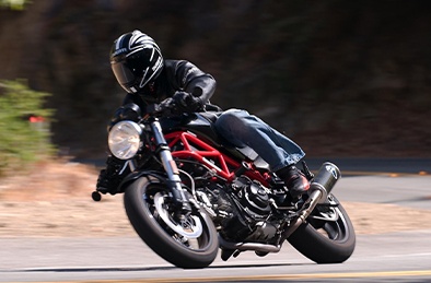 Doctor Omrani riding a motorcycle