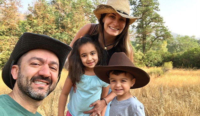 Doctor Omrani and his family outdoors