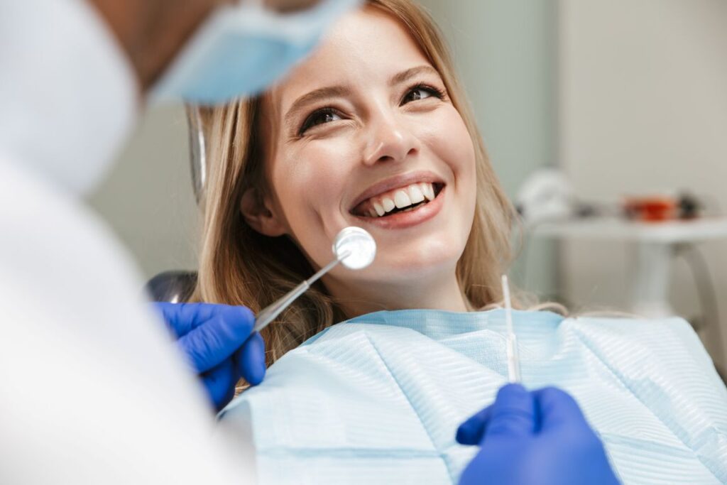 A woman smiling after getting ozone therapy